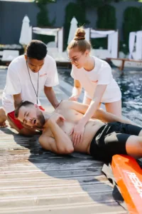 lifeguards-performing-cpr-on-unconscious-swimmer-b-2025-05-19-23-28-09-utc