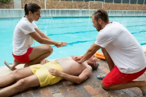 lifeguards-pressing-chest-of-unconscious-senior-ma-2025-04-04-08-32-04-utc
